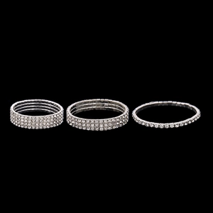Three-piece set of silver elastic rhinestone rings featuring single, triple and four rows