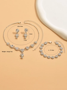 Detailed view of silver necklace bracelet set with round cut rhinestones and dimensions