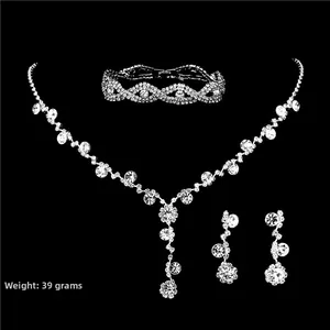 Detailed set of silver crystal necklace, bracelet and earrings with 39g weight spec