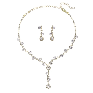 Detailed macro view of sparkling rhinestone bridal jewelry set with floral Y-shape necklace
