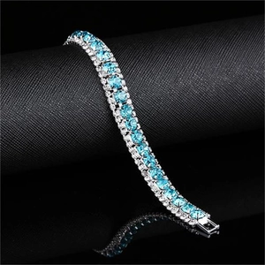 Luxurious multi-row bridal tennis bracelet with sky blue square crystals and silver setting