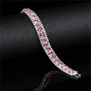 Elegant multi-row bridal bracelet featuring pink and clear crystals on silver metal