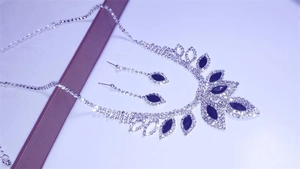 Detail view of bridal jewelry set with navy blue marquise stones and white rhinestones