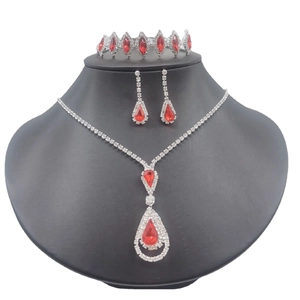 Elegant silver necklace earring bracelet set with red pear shaped rhinestones for brides