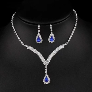 Parure bijoux de mariée avec collier en V et boucles d'oreilles goutte bleue en argent