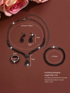Detailed view of black rhinestone jewelry set with necklace and earrings for brides