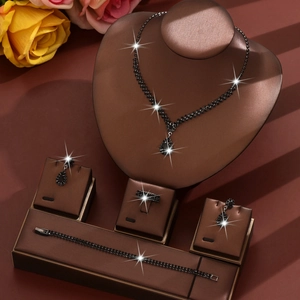 Elegant 4-piece bridal jewelry set with black teardrop zircon necklace and earrings