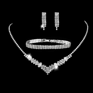 Elegant silver-toned V-shaped rhinestone necklace set with matching bracelet and earrings