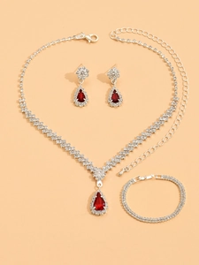 Detail of red teardrop rhinestone bridal jewelry set with necklace and earrings