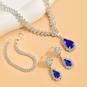 Silver bridal jewelry set with water drop blue crystals and sparkling rhinestones