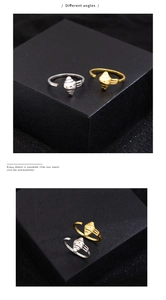 Detailansichten von Croissant-Ringen in Gold und Silber mit strukturierter Oberfläche