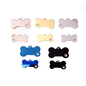 Titanium steel bone-shaped pet tags in five colors and two sizes with paw cutouts