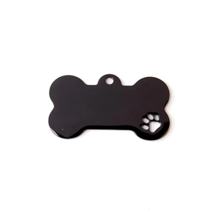Polished black bone-shaped stainless steel pet ID tag with a hollow paw print detail
