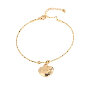 Pulsera de acero de titanio pulido con colgante de corazón dorado y cuentas facetadas