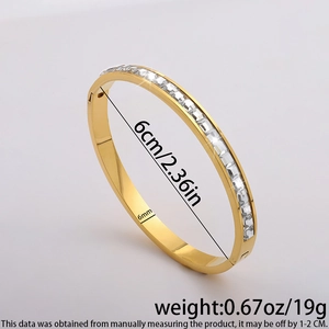 Detailed view of gold plated stainless steel bangle with dimensions and square zirconia stones