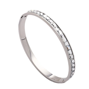 Modern stainless steel silver bangle featuring a single row of square-cut zircon stones