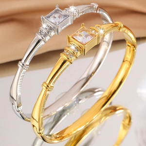 Luxurious stainless steel bangle with square zircon stone in gold and silver finish