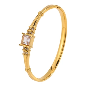 Elegant gold stainless steel bangle featuring a square-cut zircon stone with side accents