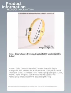 Detail view of 60mm diameter gold flower bracelet with Greek pattern and enamel inlay