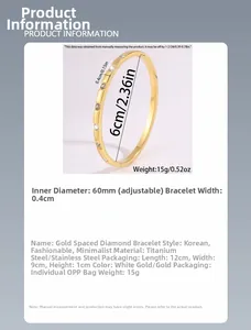 Detail view of gold titanium steel bangle with inlaid diamonds and 60mm diameter
