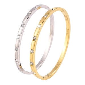 Gold and silver stainless steel hinged bracelets with seven round inset zircons