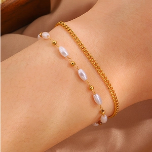 Double-layer gold stainless steel bracelet with white pearls and Cuban chain for women