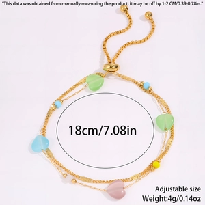Detail of adjustable gold titanium steel chain with colorful heart beads and sizing info