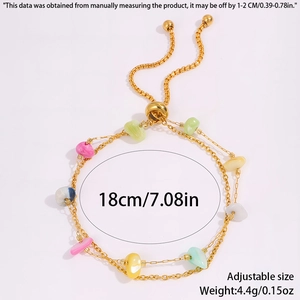 Detail showing adjustable gold chain bracelet with colorful natural stones and weight specs