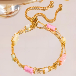 Elegant gold titanium steel bamboo link bracelet with colorful pastel beads for women