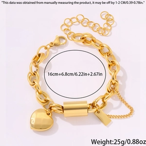 Detailed view of gold plated heart chain bracelet with lobster clasp and extension chain