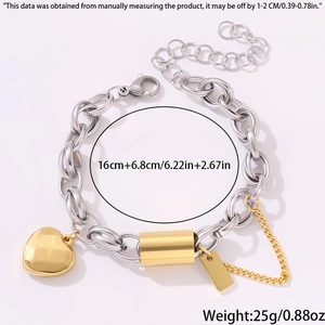 Close-up of dual-tone heart charm bracelet showing length 16cm and weight 25g