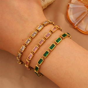 Three-piece gold plated stainless steel bracelet set with rectangular baguette zircons