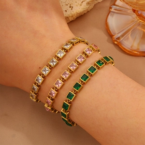 Three-piece gold-plated tennis bracelet set with white, pink, and emerald cubic zirconia