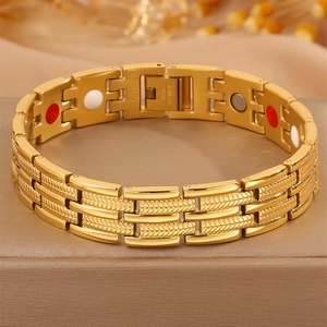 Golden stainless steel magnetic therapy bracelet with three-row link design on display box