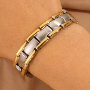 Men's two-tone stainless steel magnetic bracelet with silver and gold brushed finish