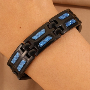 Men's titanium steel bracelet featuring blue carbon fiber inlays and double row magnets