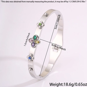 Detail view of silver stainless steel clover bracelet with multi-color rhinestones and dimensions