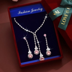 Conjunto de joyas con collar y pendientes de circón rosa en caja de regalo roja
