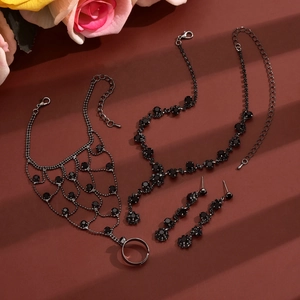 Gothic style black crystal jewelry set with necklace, drop earrings, and ring bracelet
