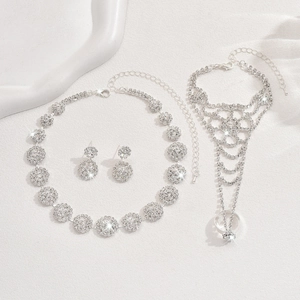 Conjunto de joyas nupciales con collar pendientes y cadena de mano con diamantes