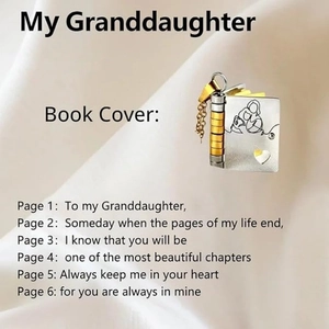 Silver and gold book pendant necklace featuring 'To my Granddaughter' text inside