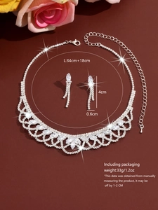 Detail view of lace tassel necklace and earrings set with measurements and silver finish