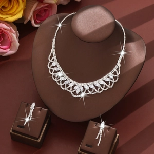 Elegant silver tassel jewelry set with shimmering crystal necklace and long drop earrings