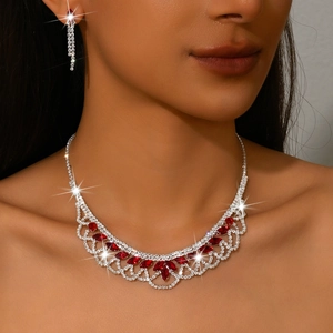 Elegant tassel necklace and earrings jewelry set with red gems and sparkling stones