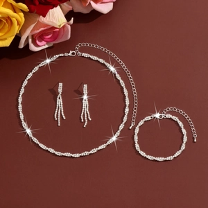 Sparkling silver-toned choker necklace set with bracelet and fringe earrings in rhinestones