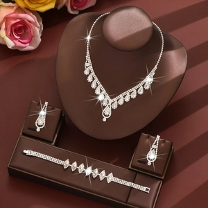 Conjunto de joyas nupciales brillantes con collar de gotas pendientes y pulsera