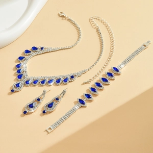 Elegante conjunto de joyas para novia con cristales azules y diamantes brillantes