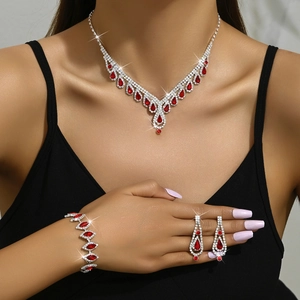 Elegante conjunto de joyas de gota de plata con piedras rojas y cristales para novia