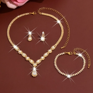 Elegante set di gioielli da sposa dorati con cristalli a goccia e orecchini coordinati