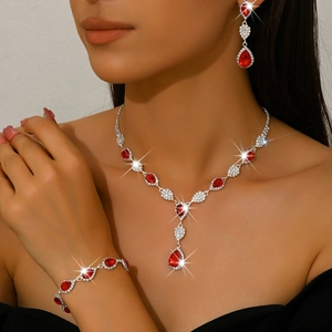 Elegant 3-piece silver jewelry set with red pear-cut crystals for wedding and evening